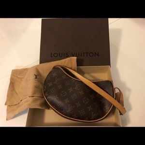 AUTHENTIC Louis Vuitton croissant shoulder bag.